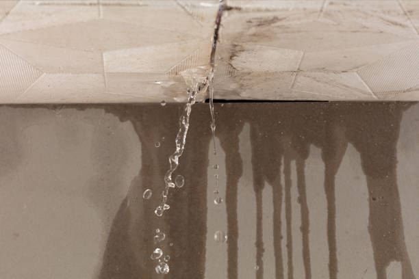 Professional Flood Damage Cleanup technician working in Dunlevy, PA